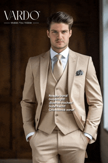 a man in a tan suit with vardo makes you visible written on the bottom
