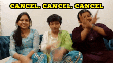 three women sitting on a couch with the words cancel cancel cancel behind them