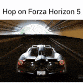 a picture of a car in a tunnel with the words hop on forza horizon 5 below it