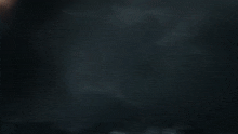 a helicopter is flying through a dark cave