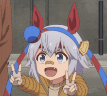 a girl with a bandage on her nose is giving the peace sign
