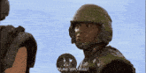 a man in a helmet says " nuke 'em rico "