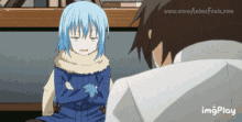 a girl with blue hair is sitting next to a man with his arms crossed and the website www.animefenix.com is in the background