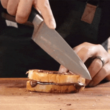 Slicing The Sandwich Joshua Walbolt GIF - Slicing The Sandwich Joshua Walbolt Lovefoodmore With Joshua Walbolt GIFs