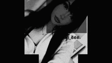 a black and white photo of a woman taking a selfie with the hashtag 66_666 .