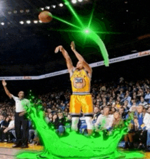 a basketball player with the number 30 on his jersey throws the ball