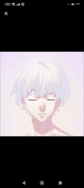a close up of a person 's face with white hair and red eyes on a cell phone .