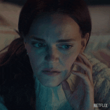 a woman with her eyes closed and the words that 's awful netflix on the bottom