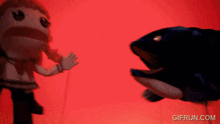 a gif from gifrun.com shows a whale and a girl
