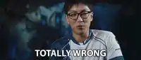 a man wearing glasses says totally wrong in front of a dark background