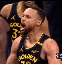 golden state warriors basketball player stephen curry is yelling during a game against the denver nuggets .