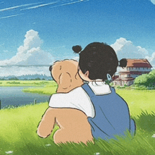 a girl is sitting in the grass with her dog