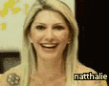 a close up of a woman 's face with the name nathalie on it .