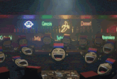 a group of monkeys laughing in front of a neon sign that says genesis