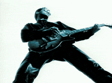 Man-playing-guitar Man-in-sunglasses GIF - Man-playing-guitar Man-in-sunglasses Guitarist-daniel-chenevez GIFs