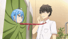 a boy and a girl are standing next to each other and the girl is holding the boy 's tie