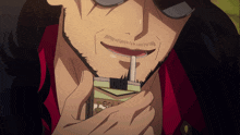 a man with a beard is drinking from a box that says gold on it