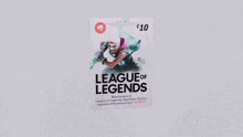a $10 league of legends gift card with a picture of a man holding a sword