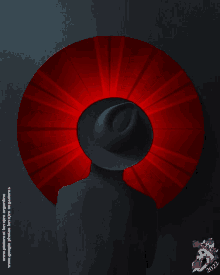 a man wearing a black hat with a red circle on it