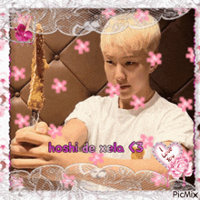a picture of a boy with the words hoshi de xela < 3