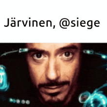 a close up of a man 's face with the words " jarvinen @siege " below it