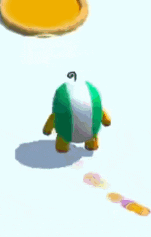 a green cartoon character is standing next to a pie on a white surface .