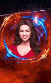 a woman in a red shirt is surrounded by a circle of light