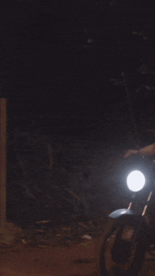 a man is riding a motorcycle with a woman on the back