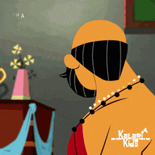 a kalari kids cartoon shows a man wearing a necklace