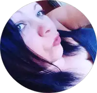 a woman in a blue tank top is taking a picture of herself in a circle