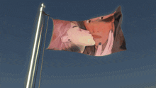 a flag with two women kissing on it