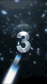 the number 3 is surrounded by bubbles and light