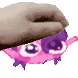 a hand is holding a pink and purple monster .