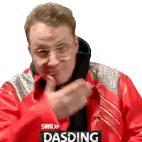 a man wearing a red jacket with the word dasding on the bottom