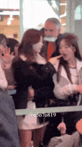 a blurry photo of a group of people with the number 05070819 on the bottom right