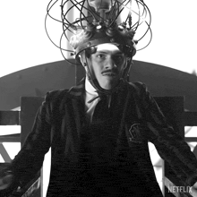 a black and white photo of a man with a netflix logo