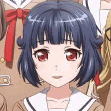 a close up of a girl 's face with red eyes
