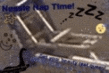 a picture of a nap time sign with a cat sleeping on a chair .