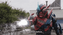 a red and blue monster with the word build on it