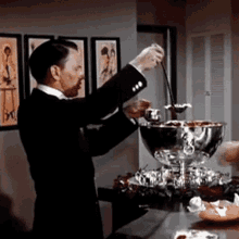 Pouring Frank Sinatra GIF - Pouring Frank Sinatra Jingle Bells GIFs