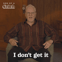 a man is sitting in a chair with the words i don 't get it on the bottom