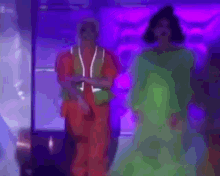 a blurry picture of a person in a purple room