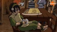 a cartoon of a girl sitting at a table with a nickelodeon logo in the background