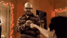 Community Fist Bump GIF - Community Fist Bump David Cross GIFs