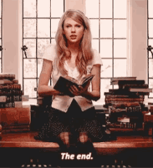 Taylor Swift The End GIF - Taylor Swift The End Reading GIFs