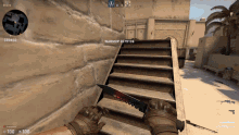 a person is holding a knife in front of a staircase with the words warmup written on it