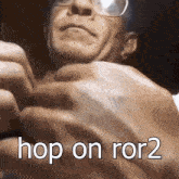 a man with glasses says hop on ror2 in a close up