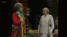 two men are standing next to each other and one of them is saying be silent watch it mestor