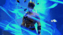 a man is standing in a dark room with a blue light behind him .