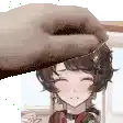 a hand is touching a girl 's head with headphones on .